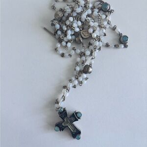 Virgin saint and angel 
Elegant Silver and Gold Cross Pendant Necklace